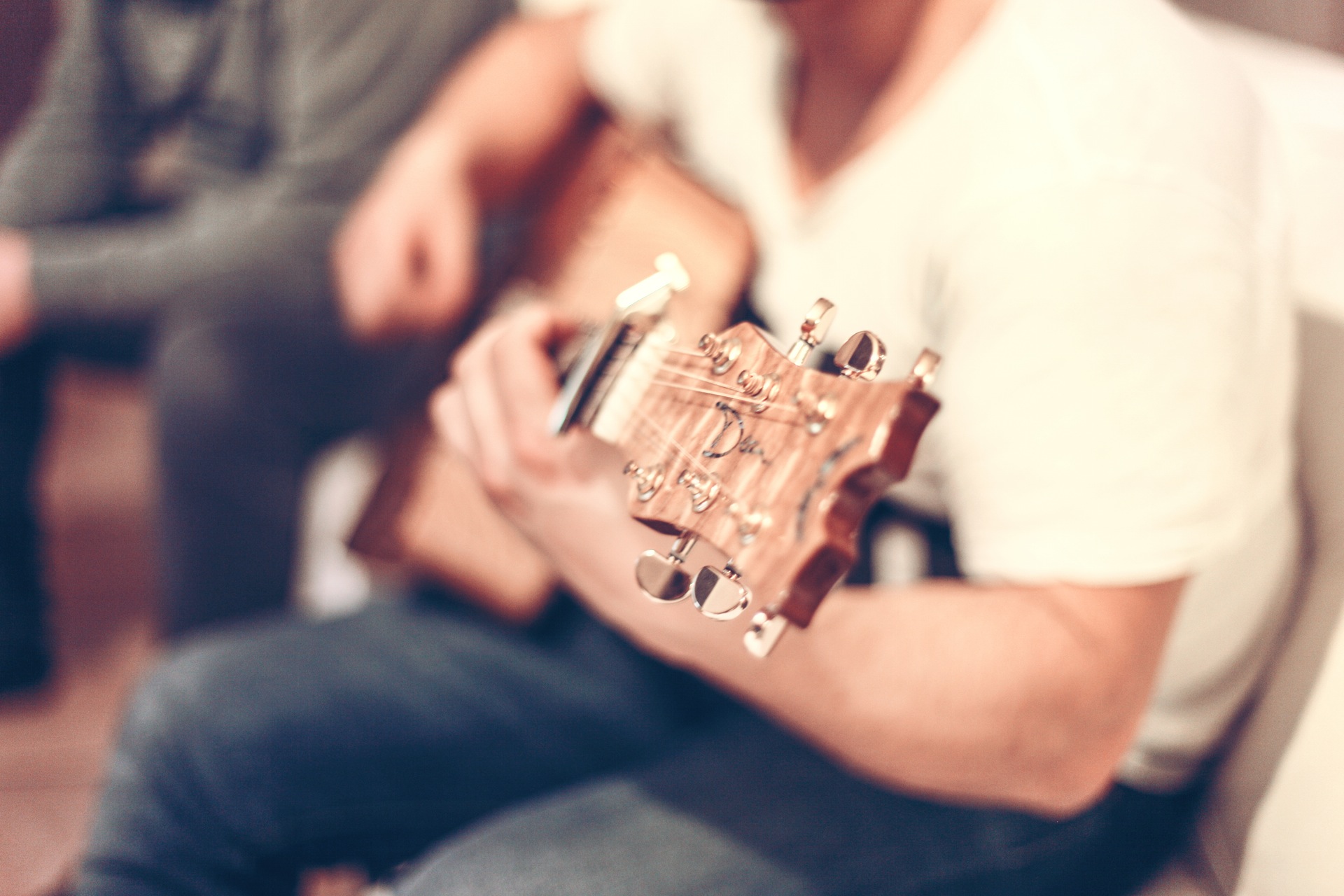 Man playin guitar- taken from the bootstrap example photos